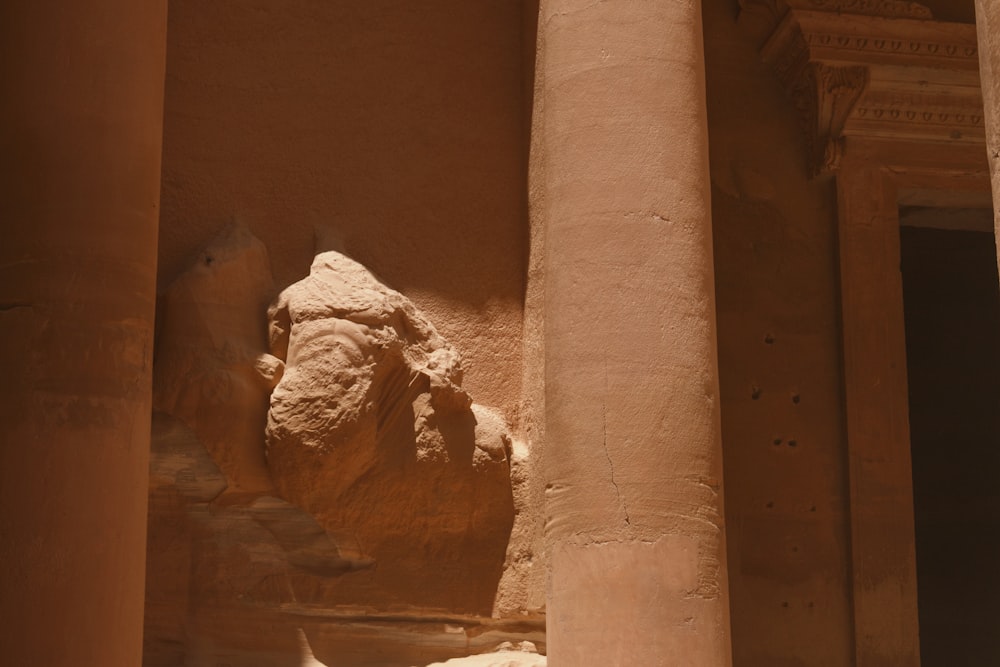 a stone sculpture of a person