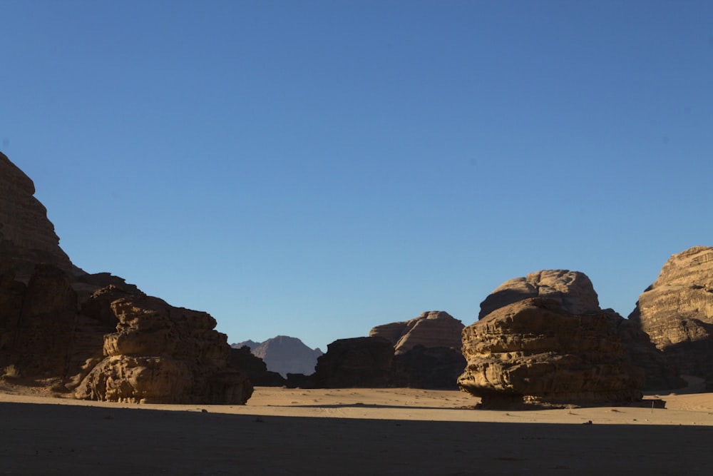 a desert landscape with large rocks