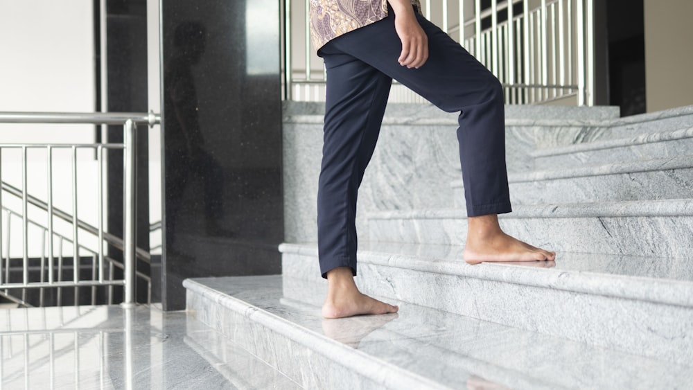 a man standing on a set of stairs