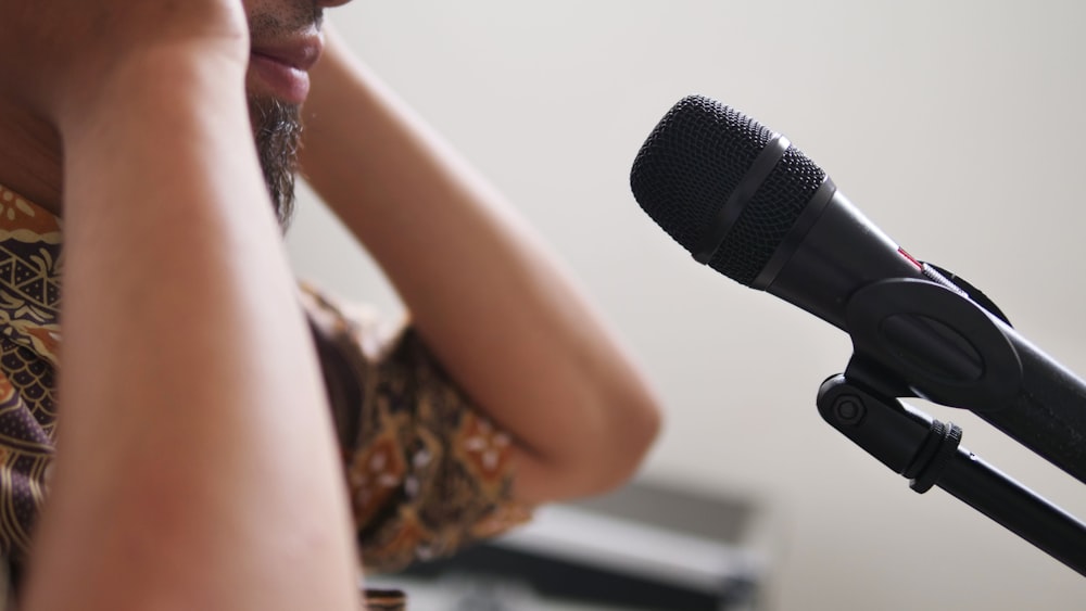 a woman using a microphone