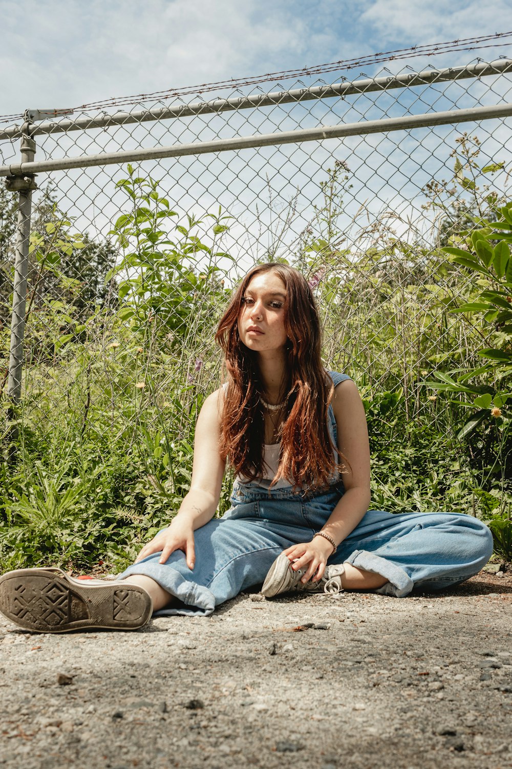 a woman sitting on the ground