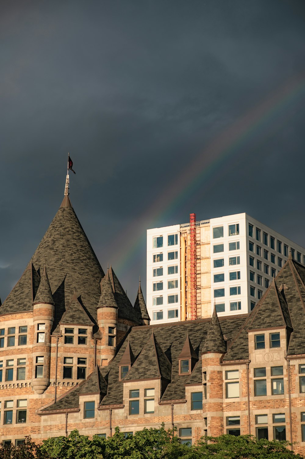 a rainbow over a building
