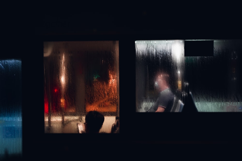 a person sitting in a window