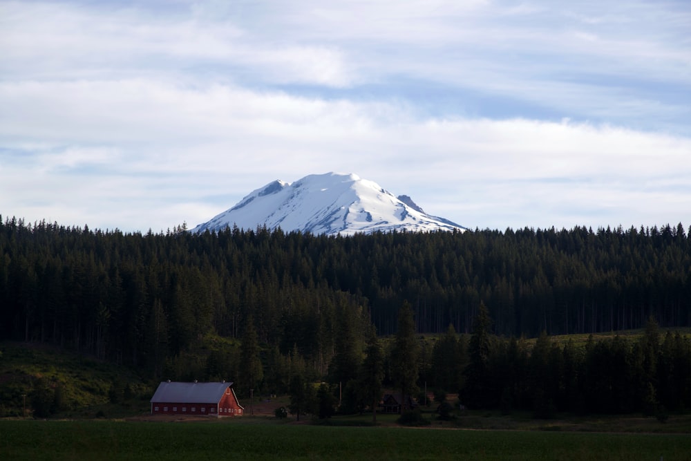 a house in front of a mountain