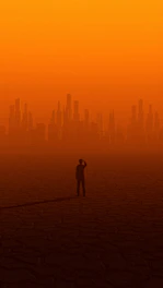 A lone figure standing on a cracked earth landscape beneath a dark, stormy sky with distant city ruins.