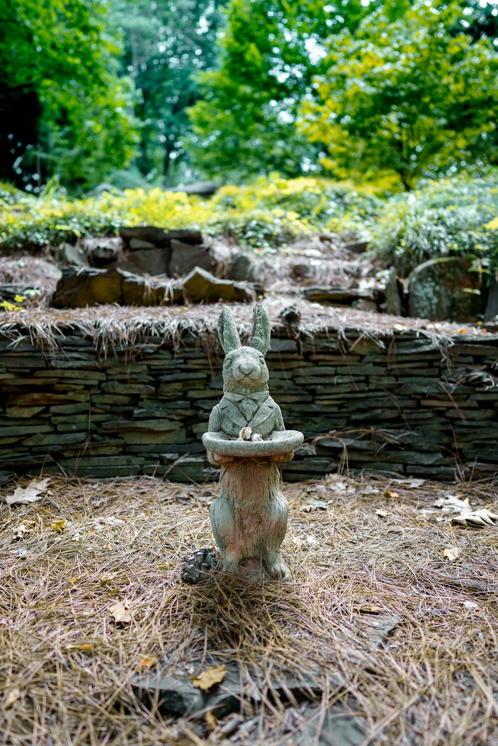 a statue in a garden