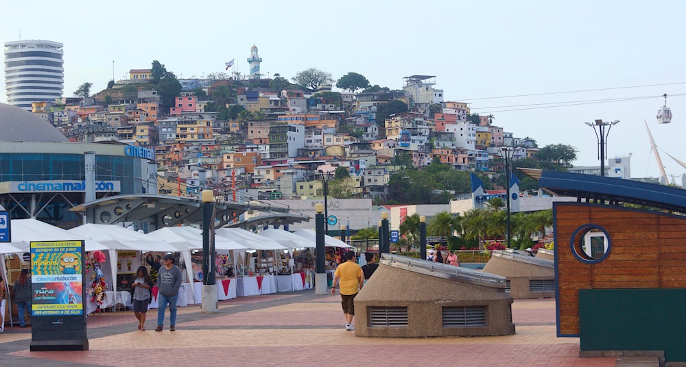 people walking near tents