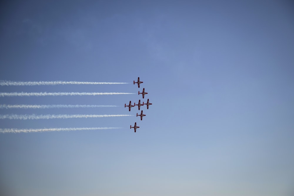 a group of airplanes flying in the sky