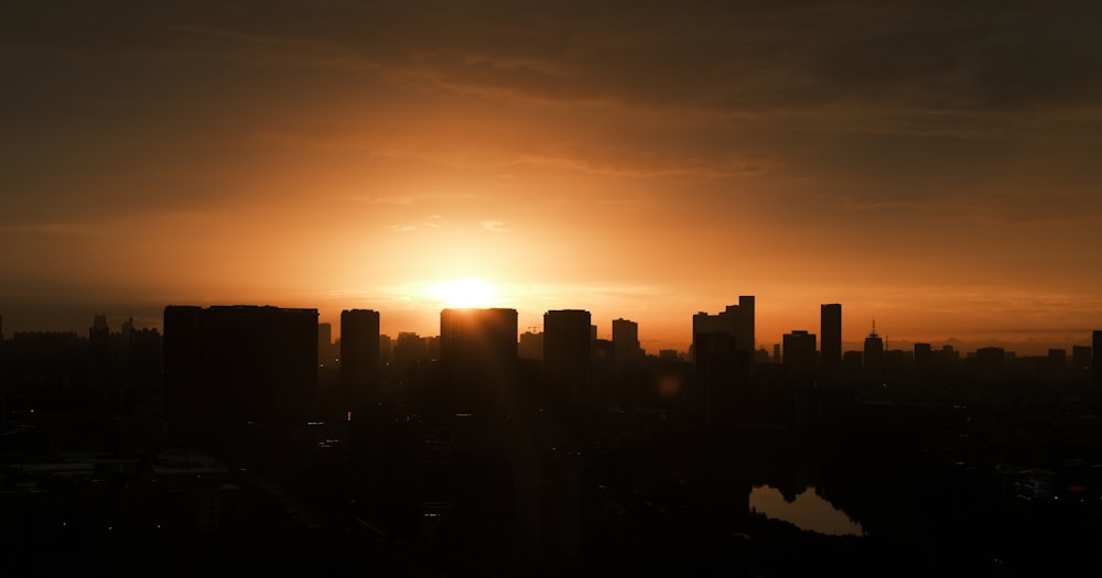 a city skyline at sunset