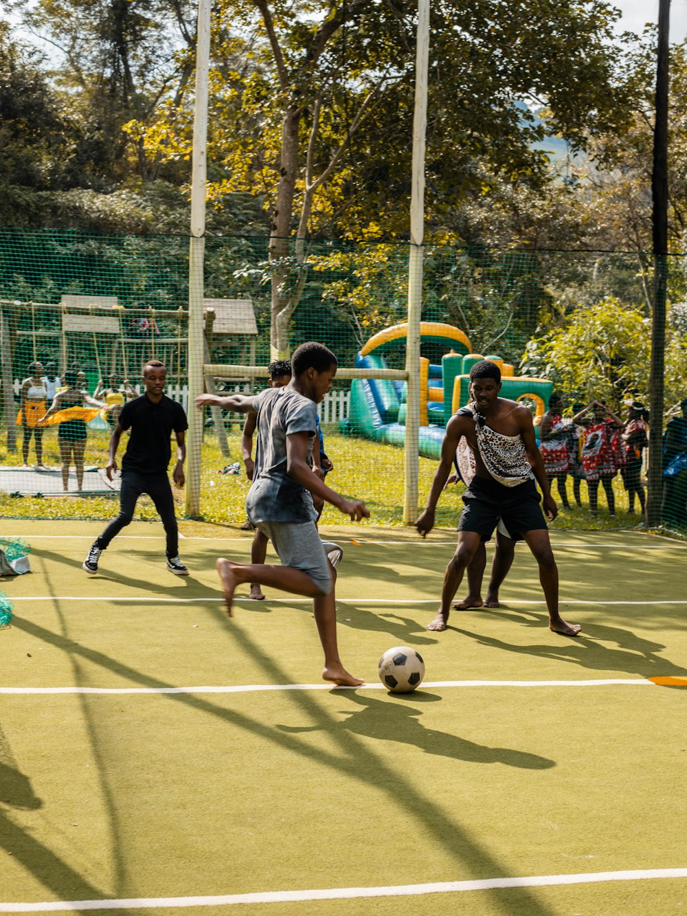 a group of people play football