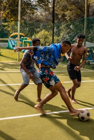 a group of men playing football
