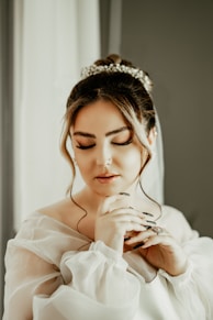 a woman with her eyes closed