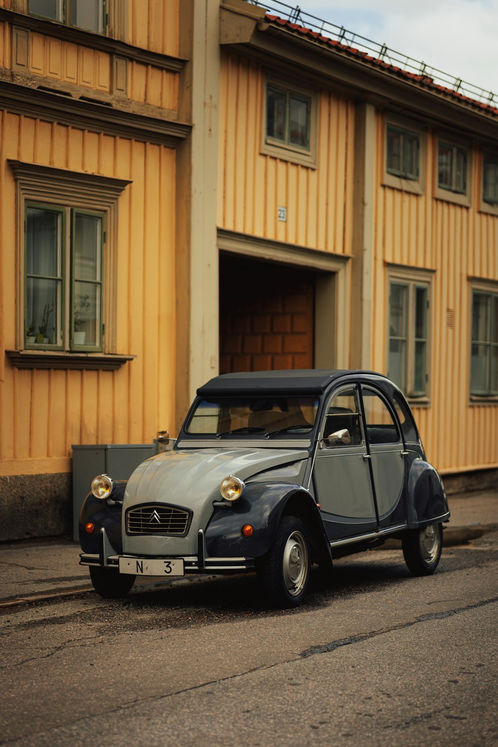 a car parked in front of a building