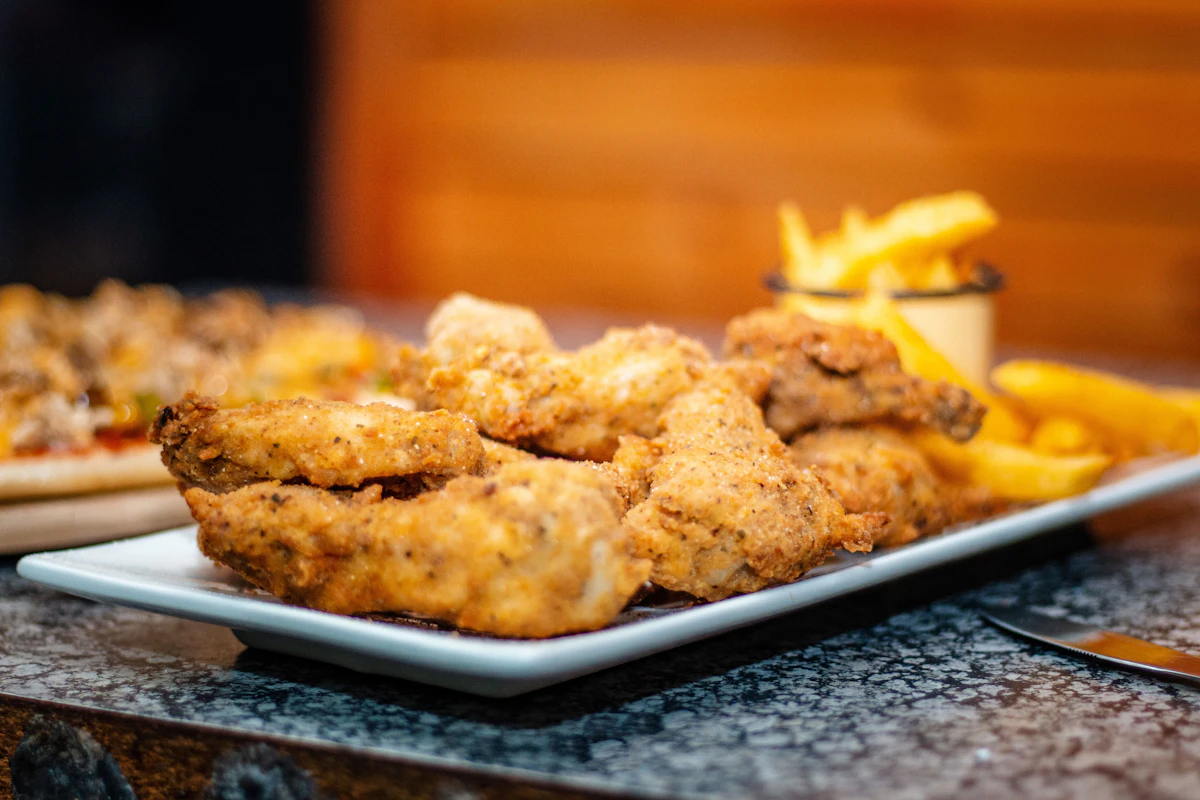 A crispy fried chicken combo plate, golden brown and freshly served