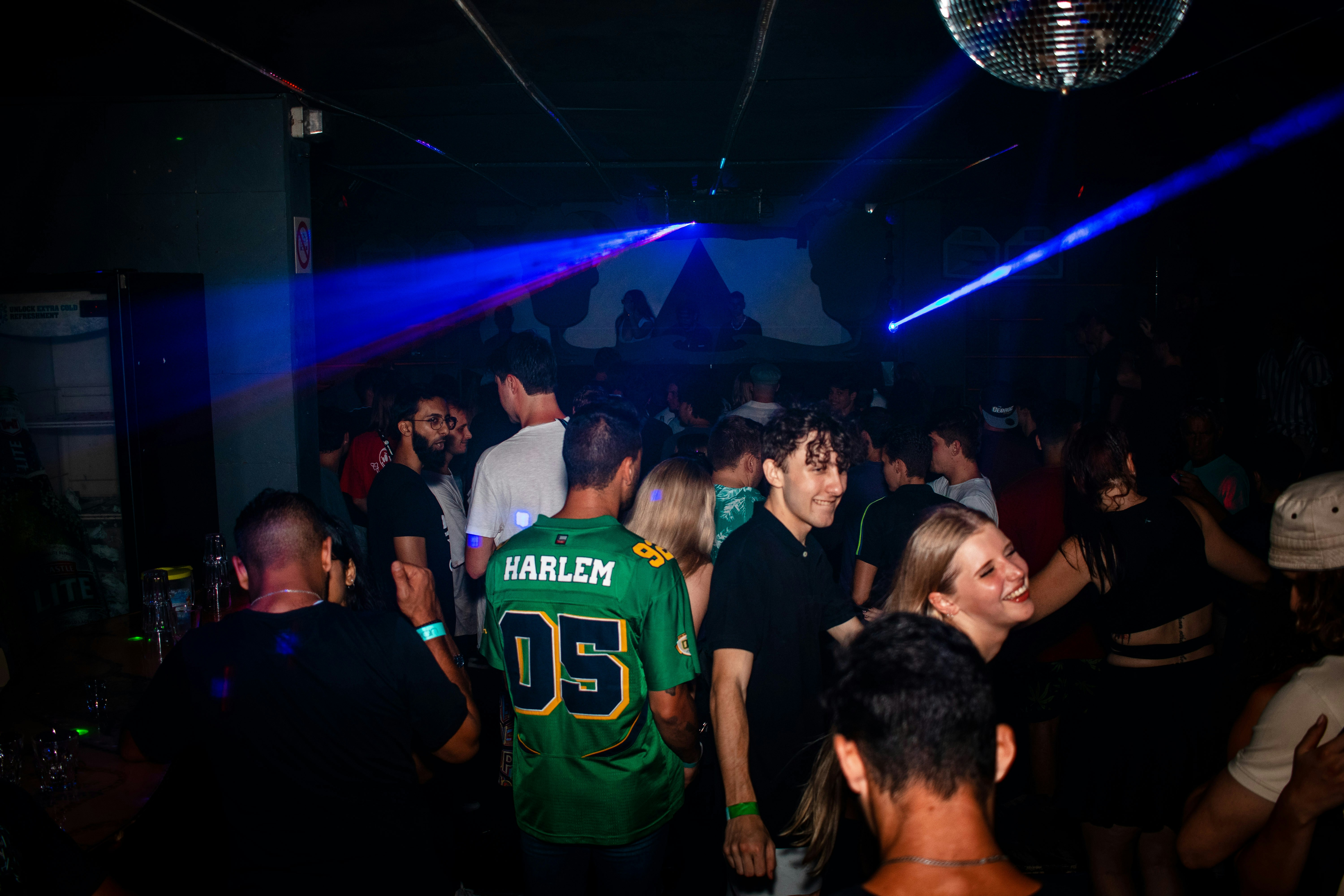 a crowd of people in a club
