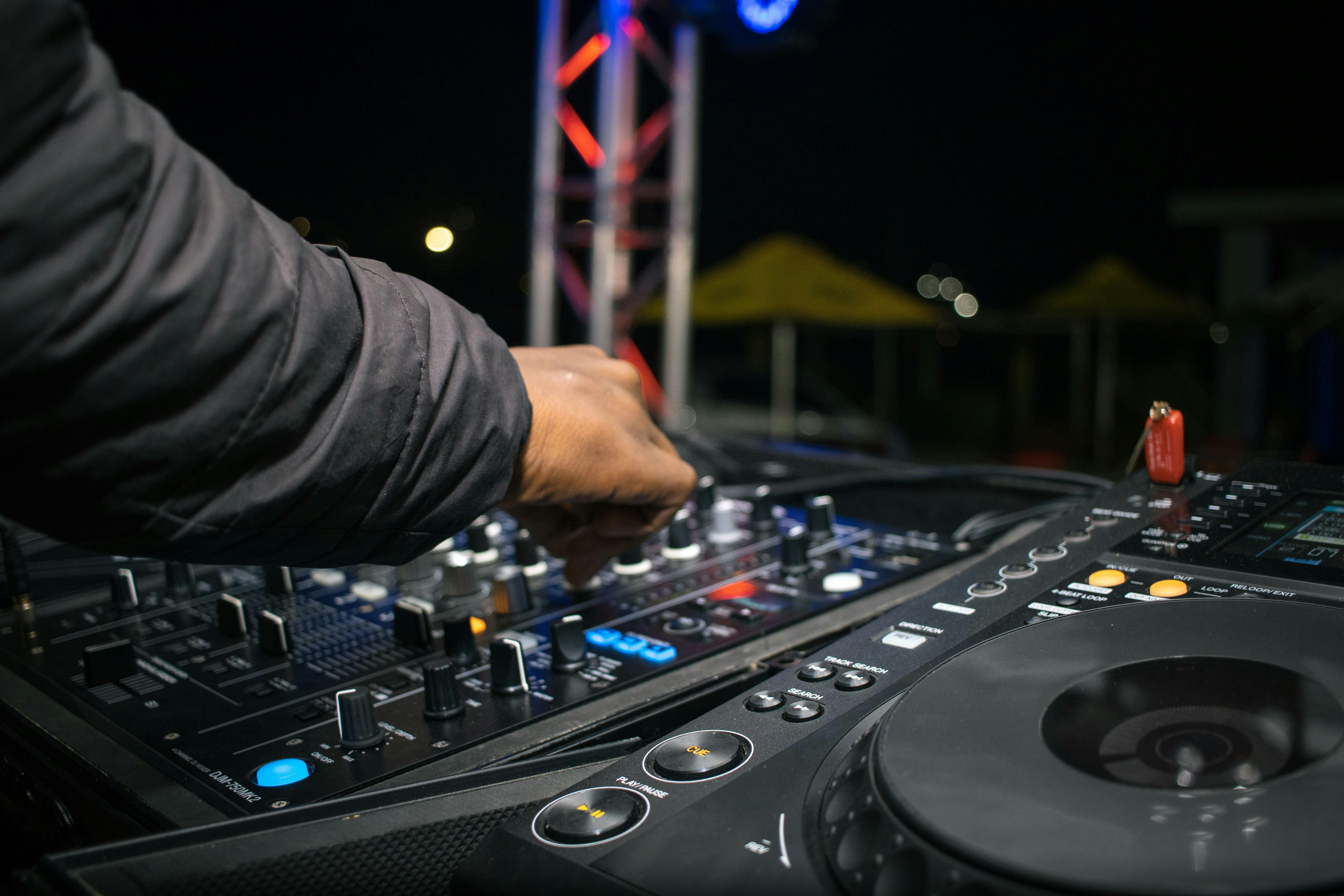 A person playing a music instrument photo – Free Human Image on Unsplash