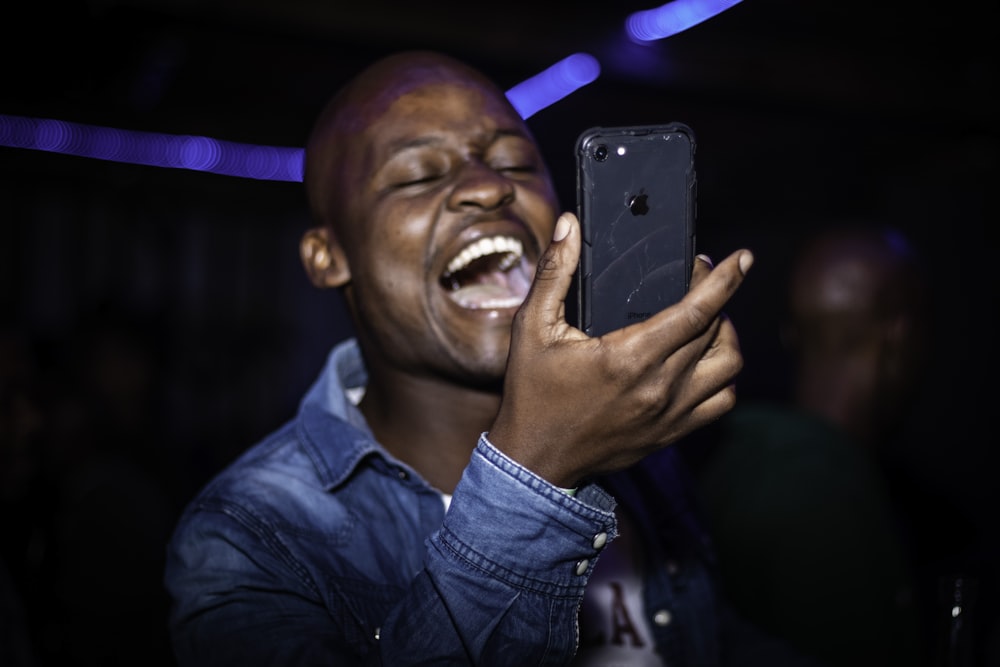 a man holding a phone