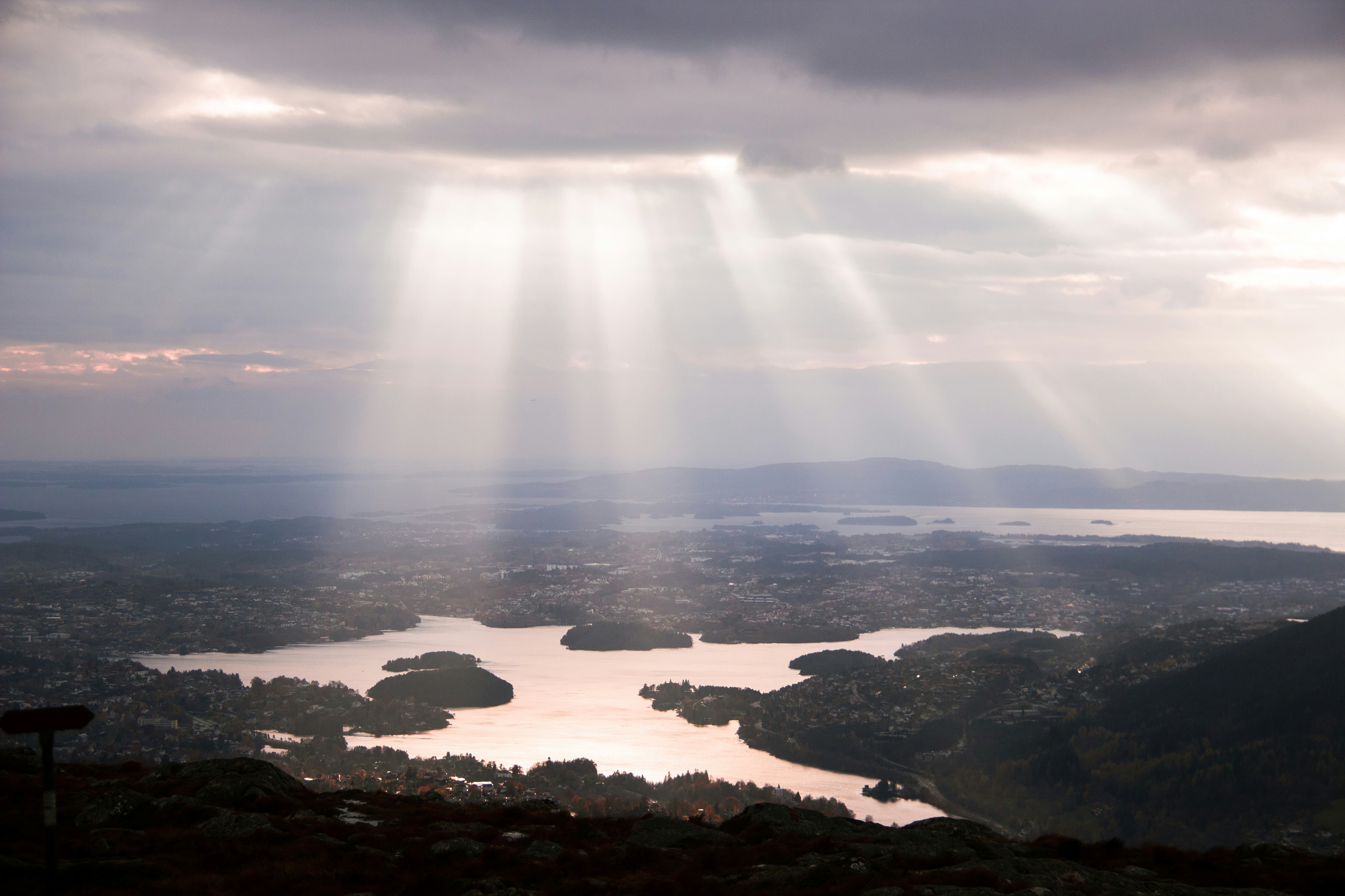 a large body of water with a bright light shining on it