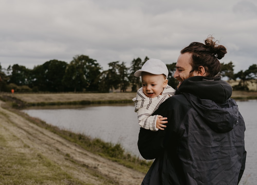 a person holding a baby