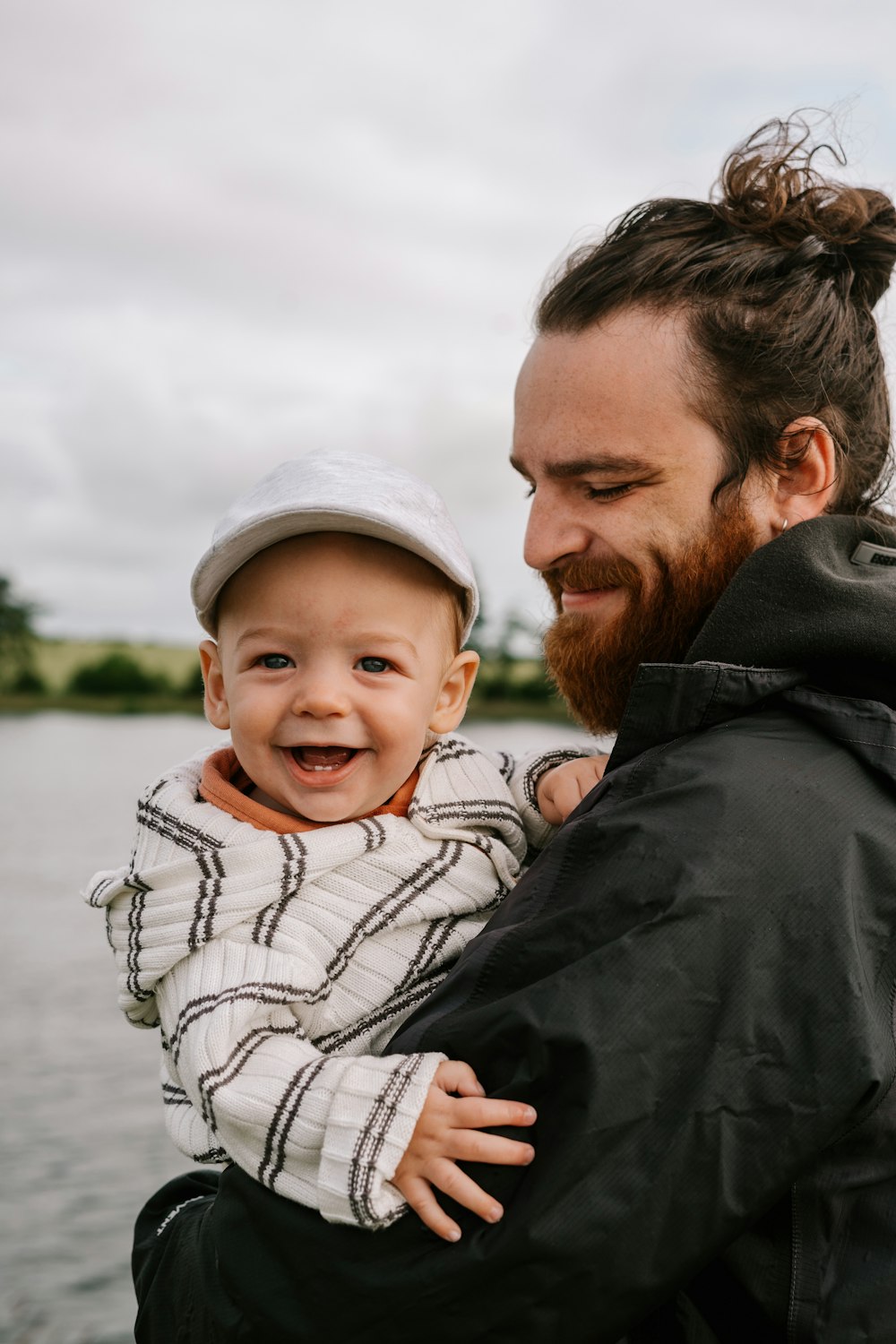 a man holding a baby