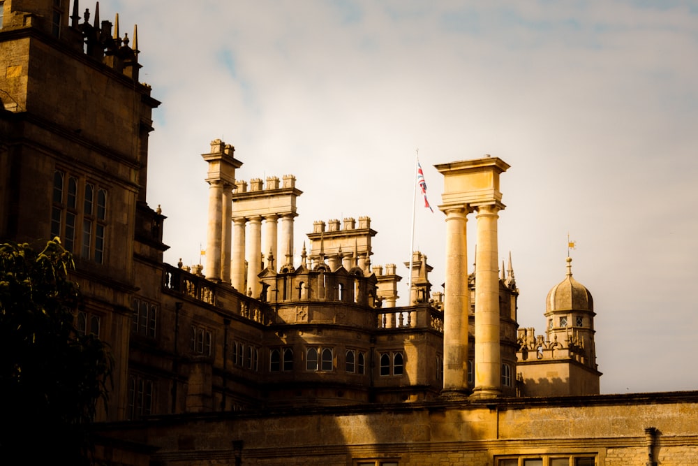 a building with pillars and a flag