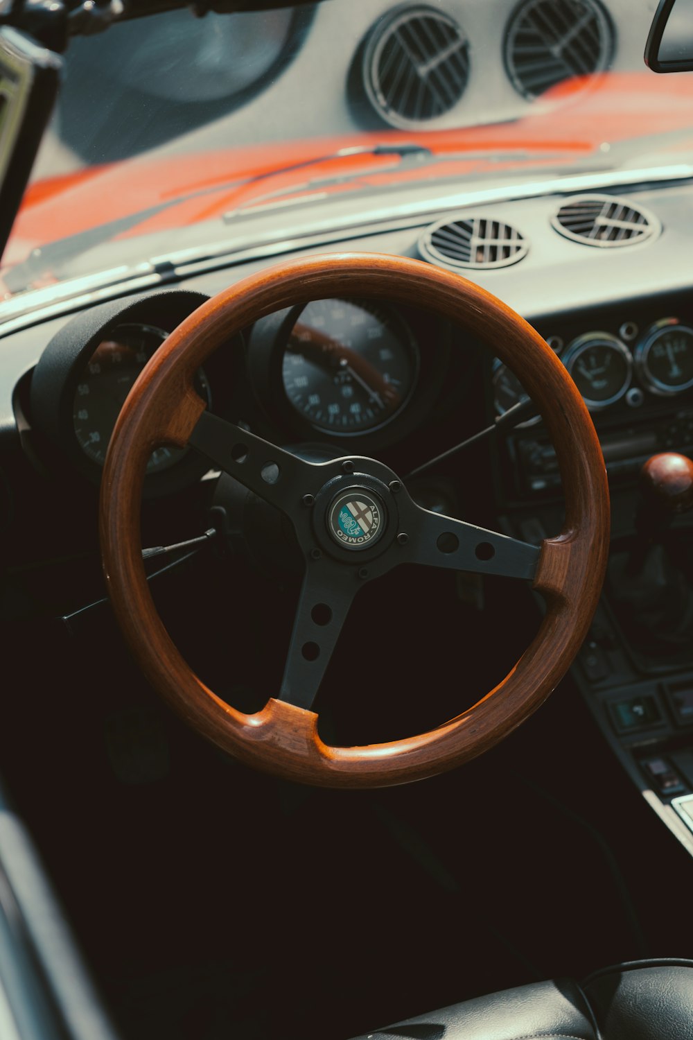 a steering wheel and dashboard of a car