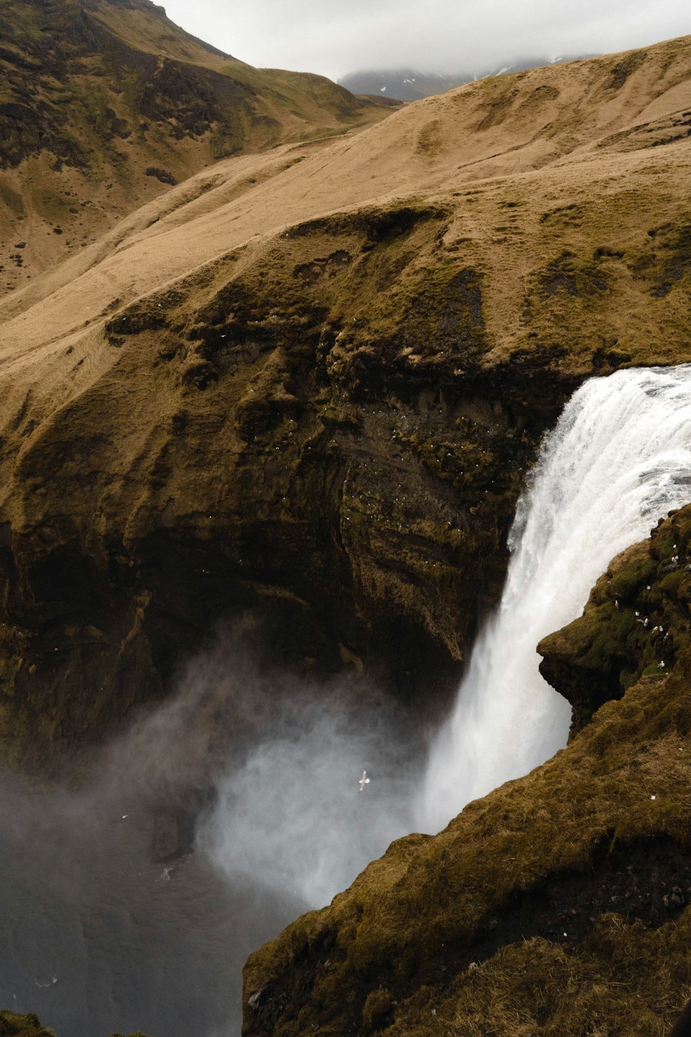 a waterfall in a rocky area