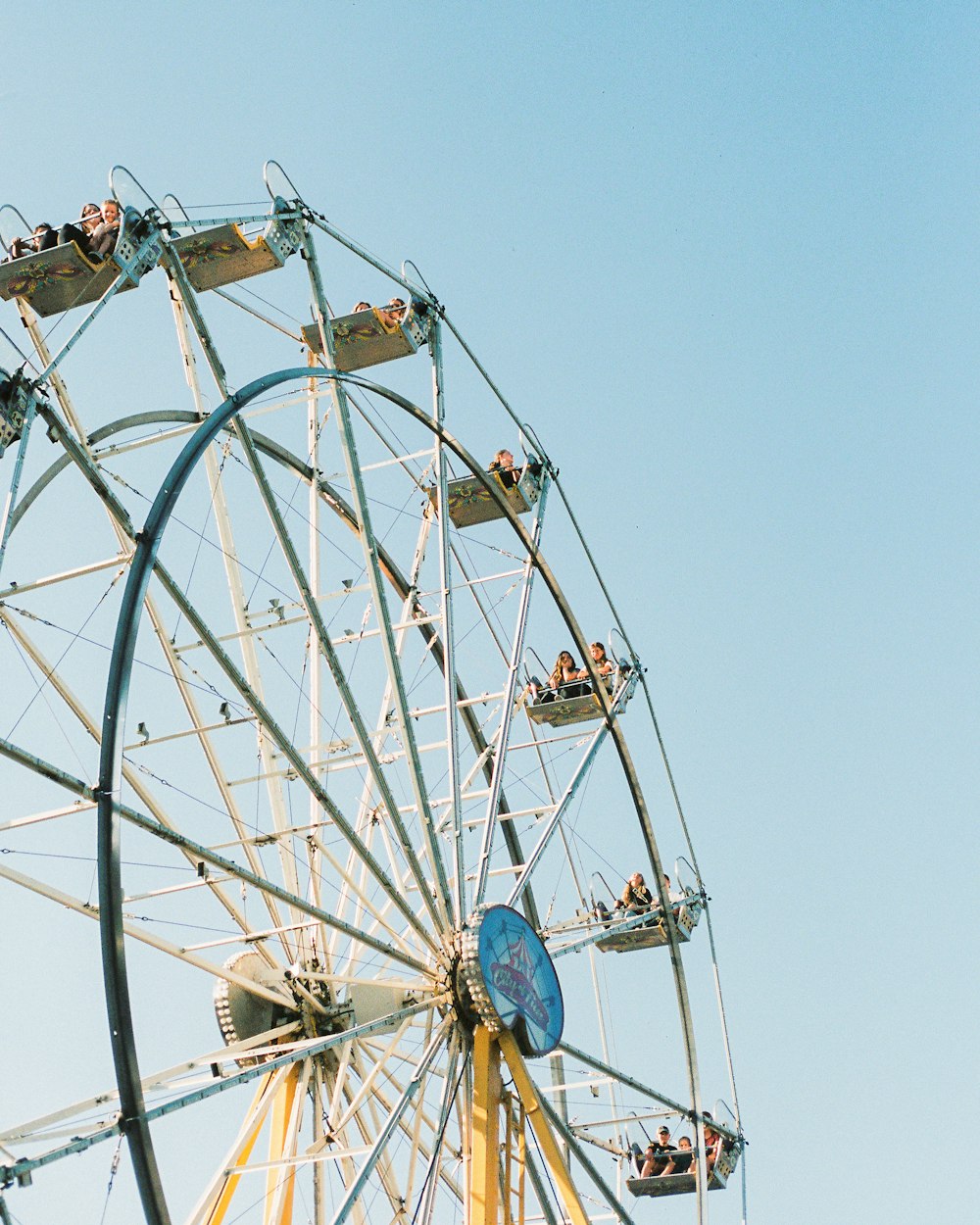a ferris wheel with people on it