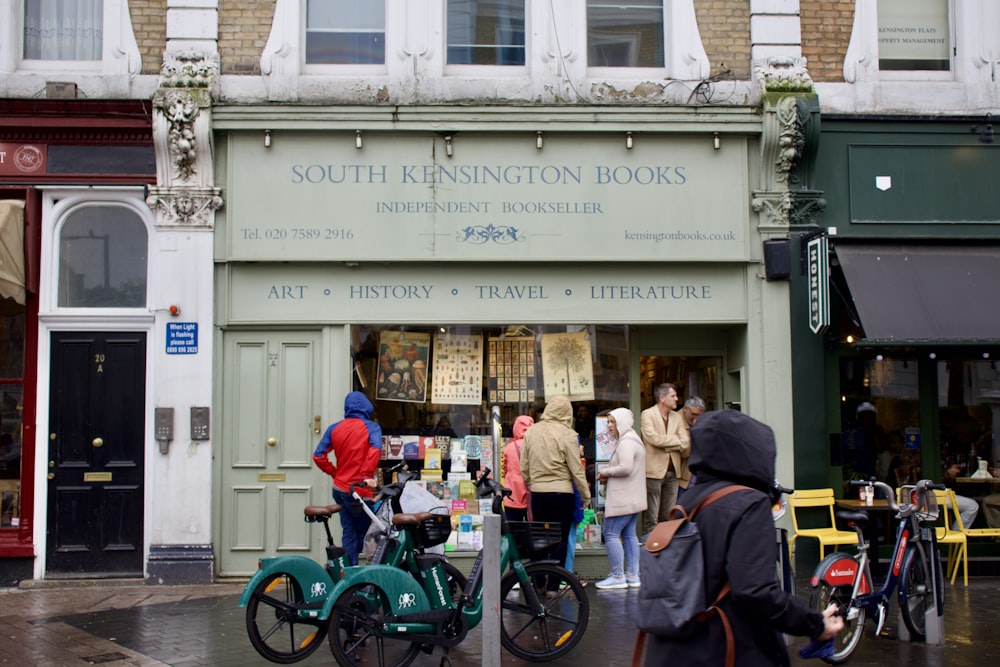 a group of people outside a store