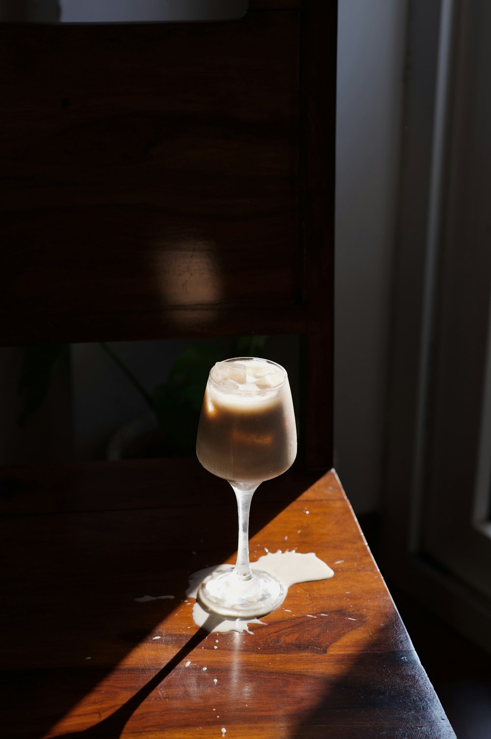 a glass of champagne on a table