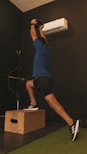 a man jumping on box