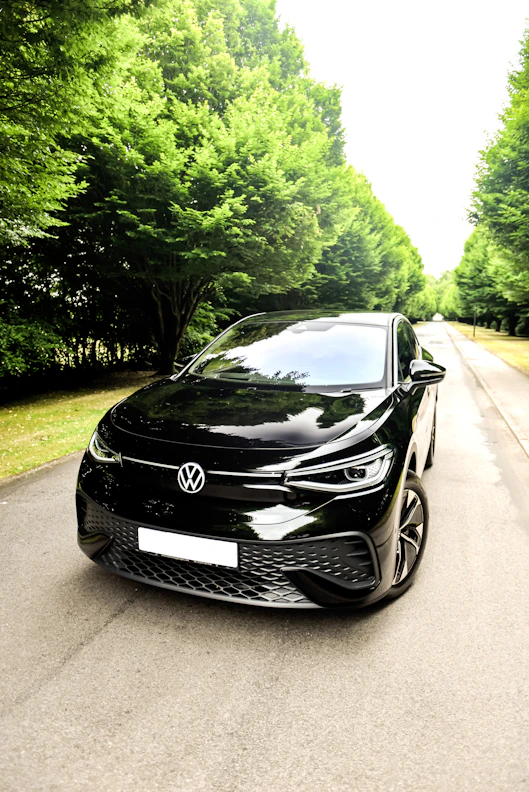 a black car parked on a road