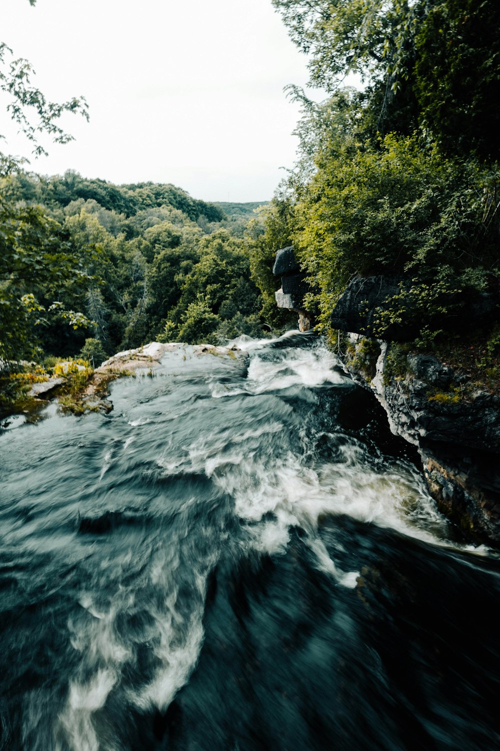 a river with a waterfall