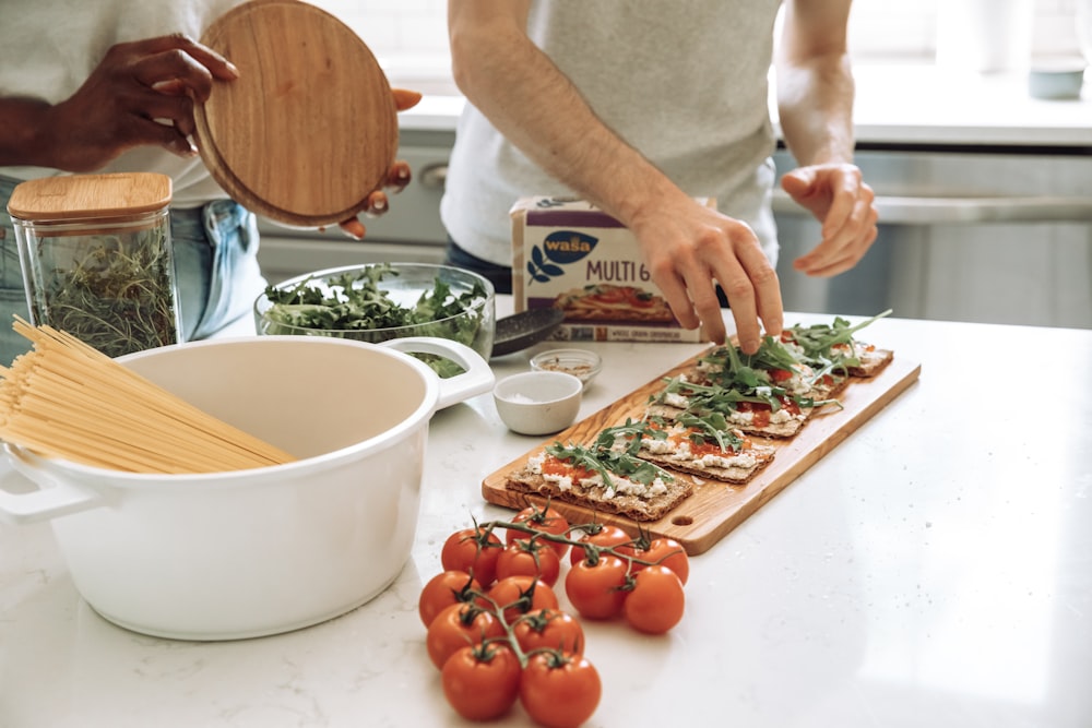 a person preparing food on a table