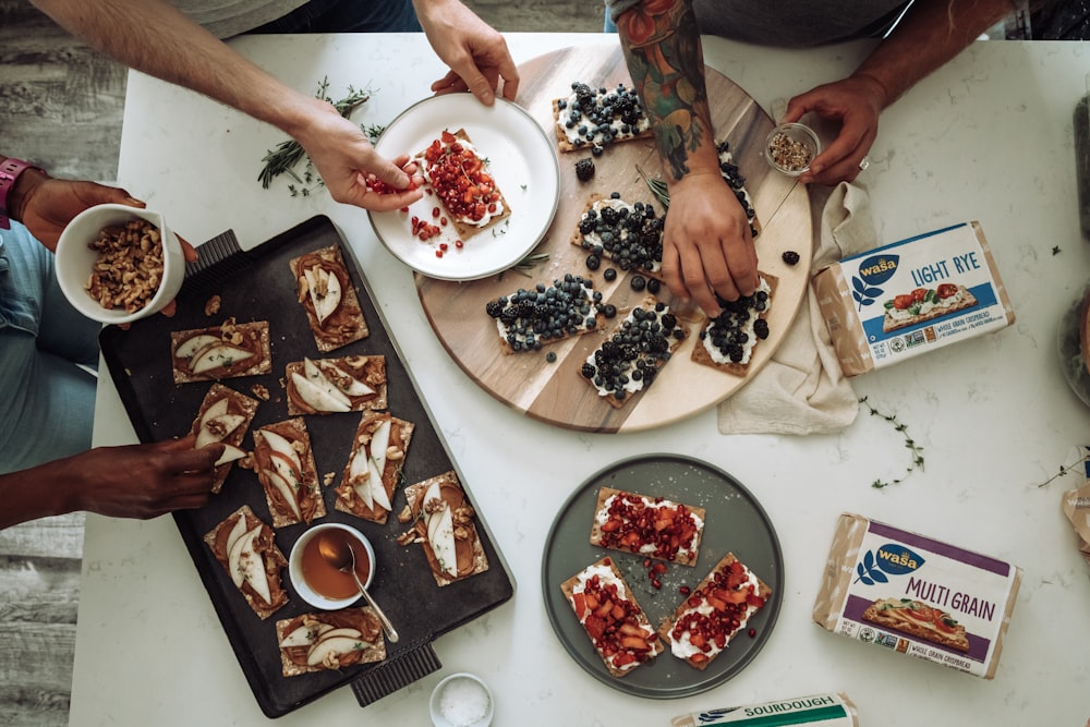 people eating food at a table