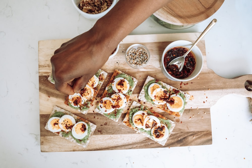 a person cutting sushi