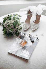 a bouquet of flowers and shoes