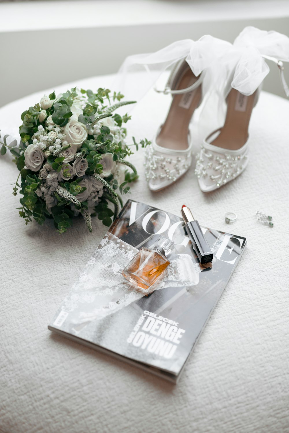 a bouquet of flowers and shoes