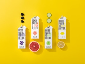 a yellow background with a few different foods