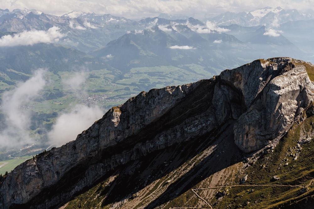 a mountain with clouds