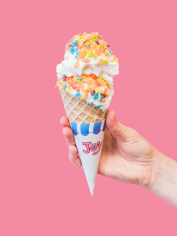 Ice cream cone with a rainbow of sprinkles