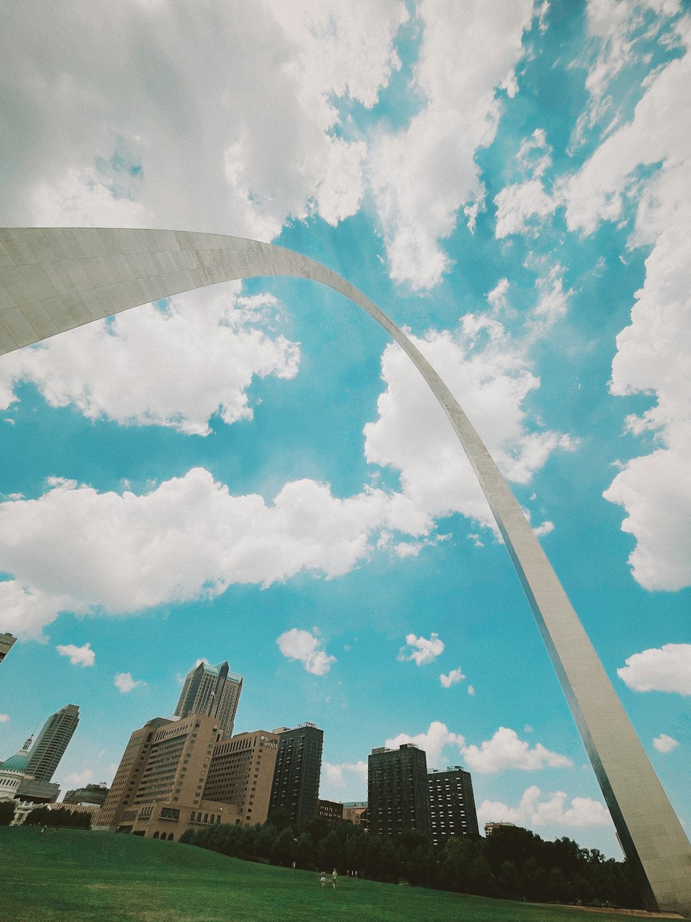 a large arch over a city
