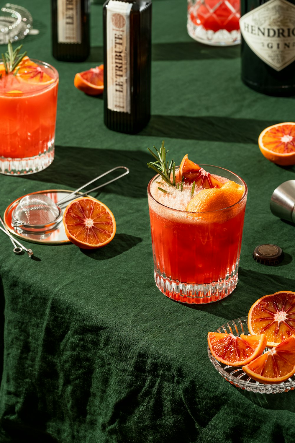 a glass of orange juice on a table