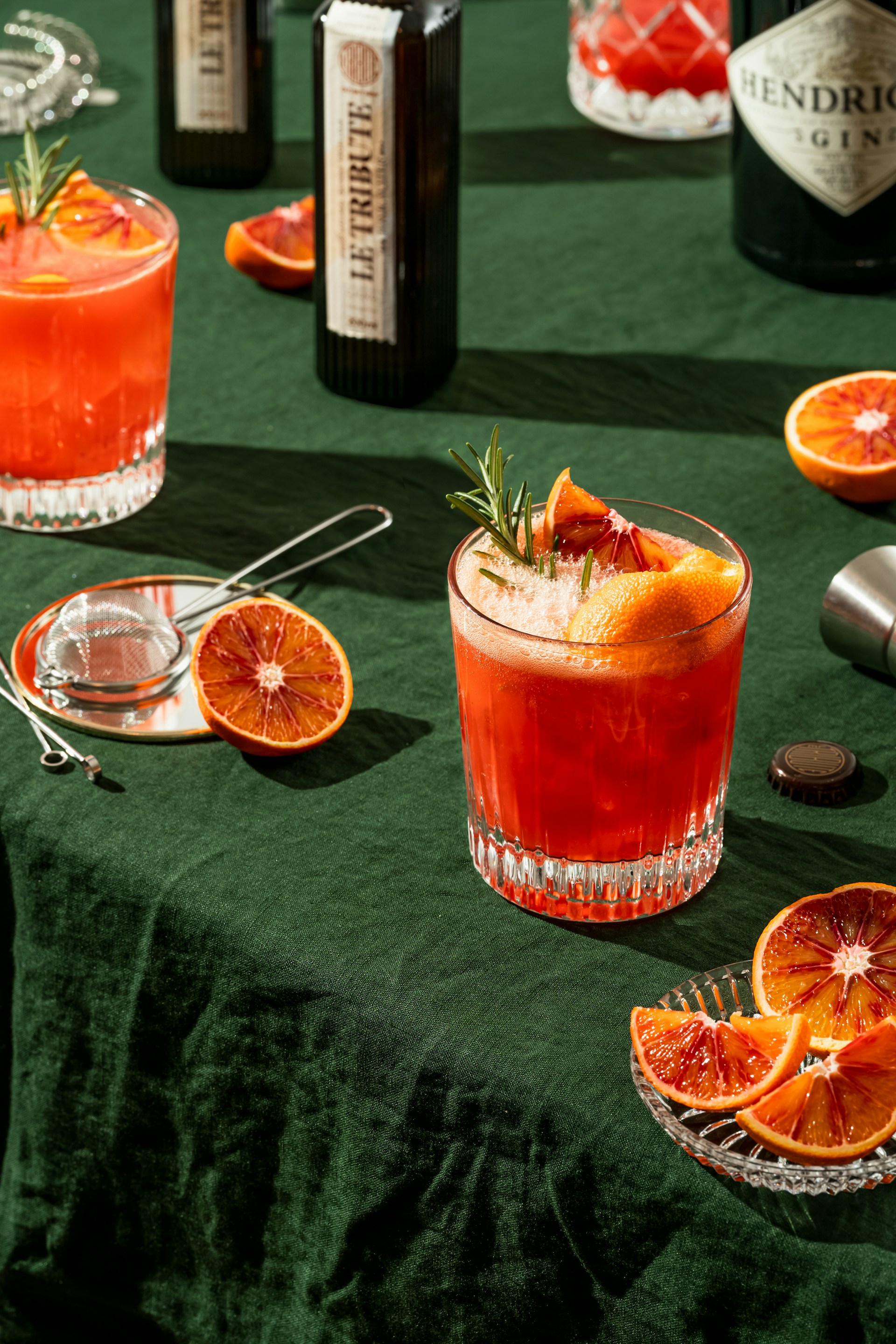 a glass of orange juice on a table