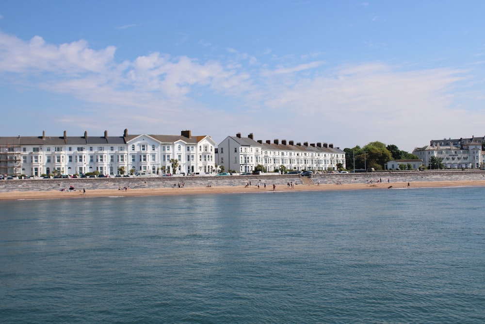 a beach with buildings along it