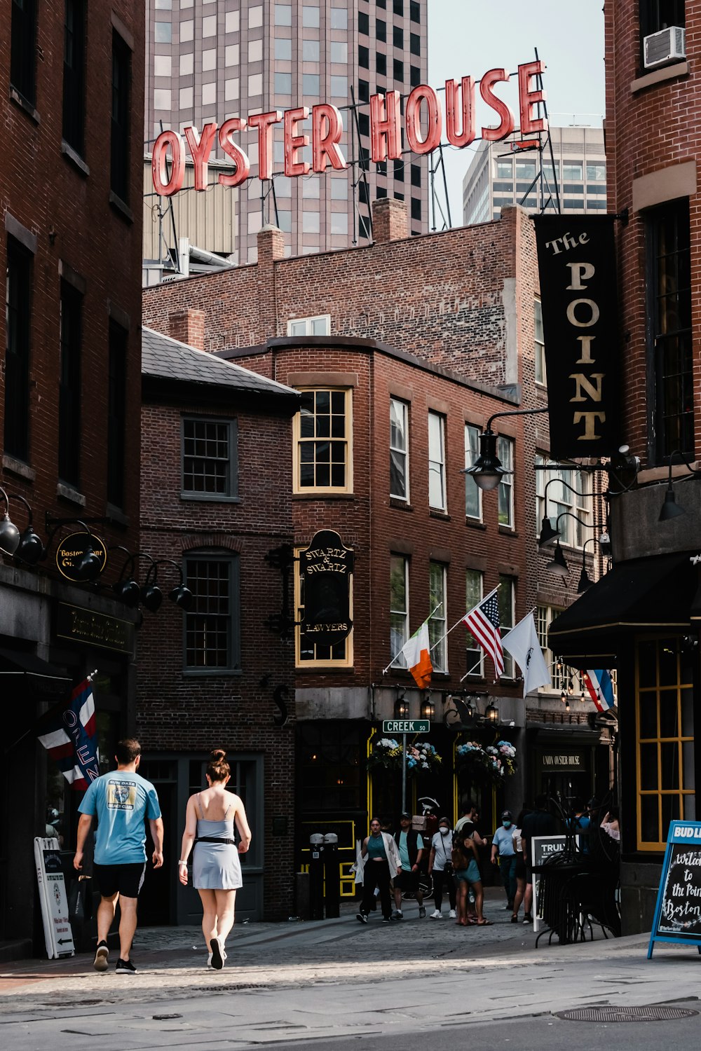 a brick building with a sign on it