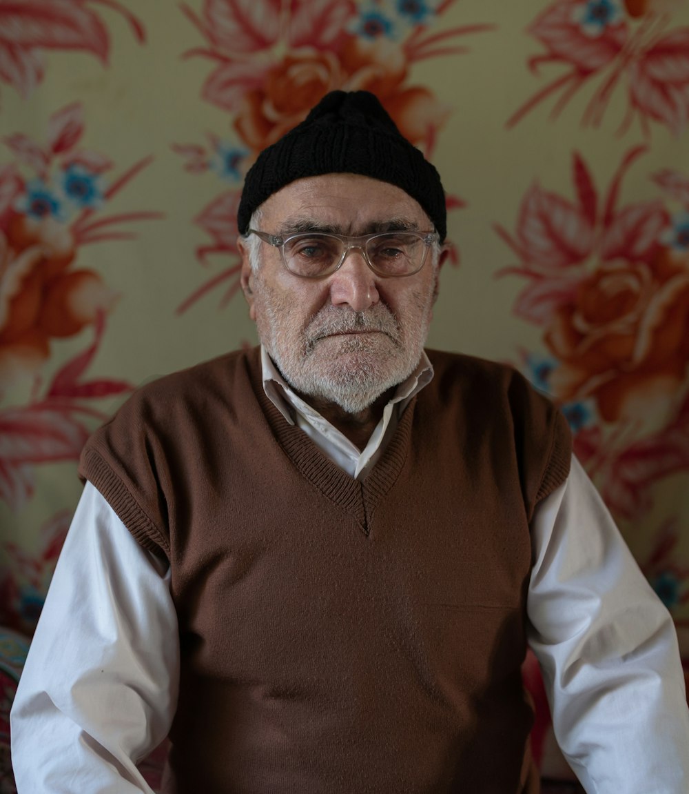 a man with a beard and glasses