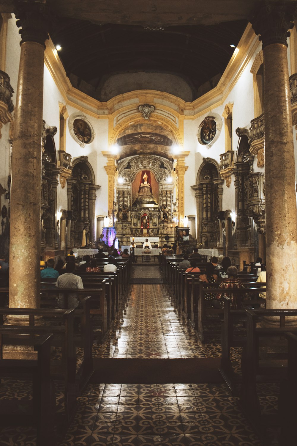 a large church with many people sitting at tables