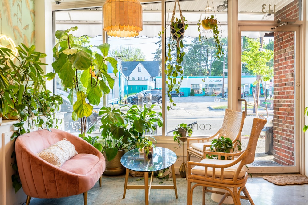 a patio with chairs and a table