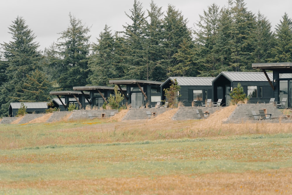 a building with a dirt field in front of it